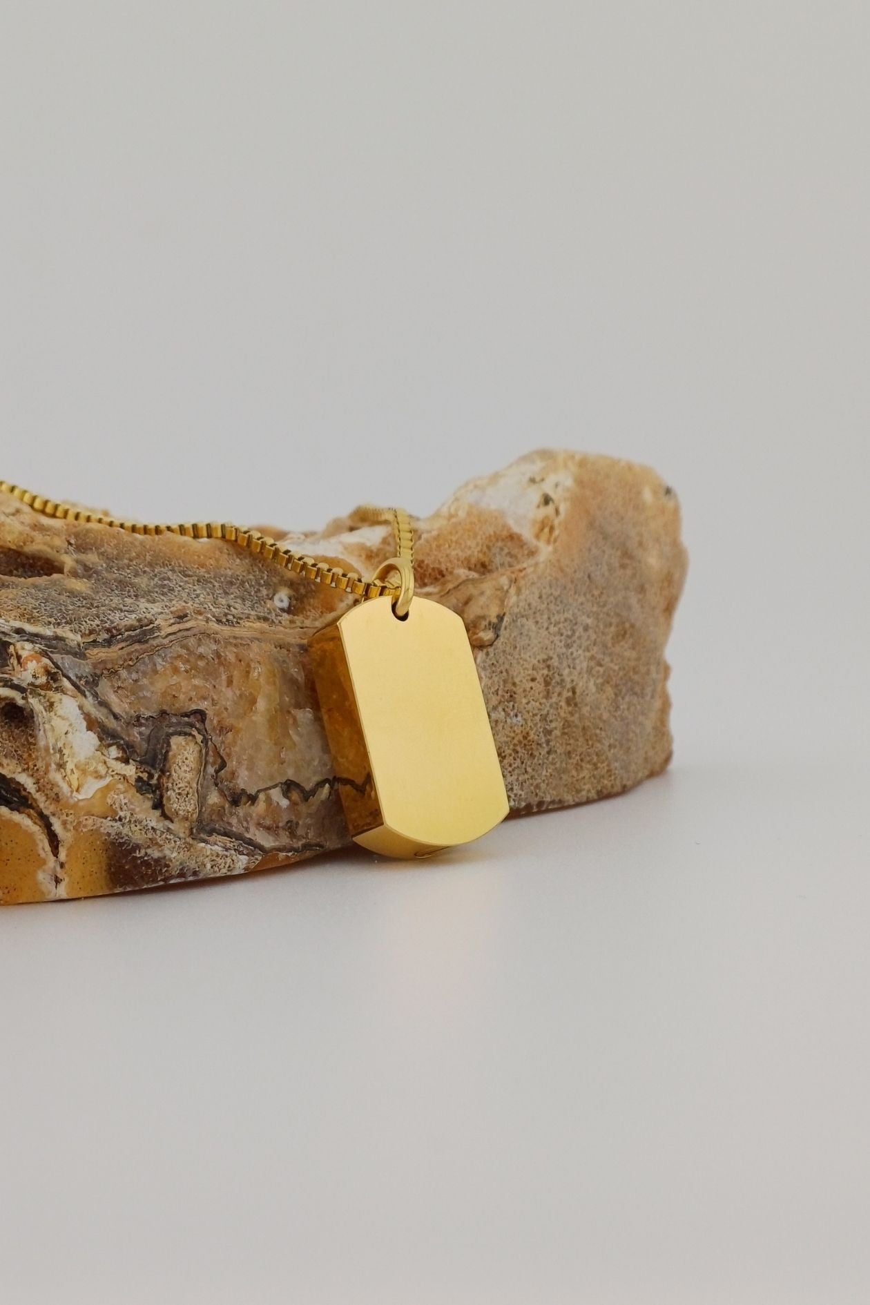 ashanger dog tag goudkleurig