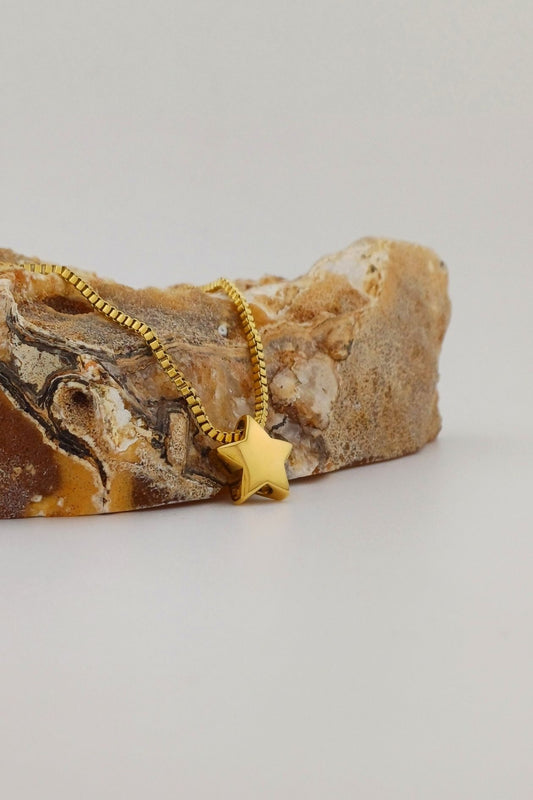 ashanger sterretje goudkleurig