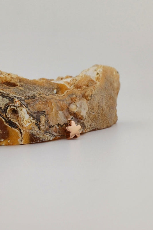 bloem ashangertje rosegoudkleurig