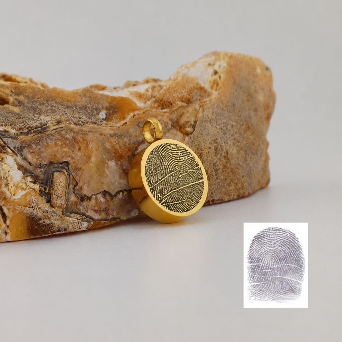 vingerafdruk ashanger goud