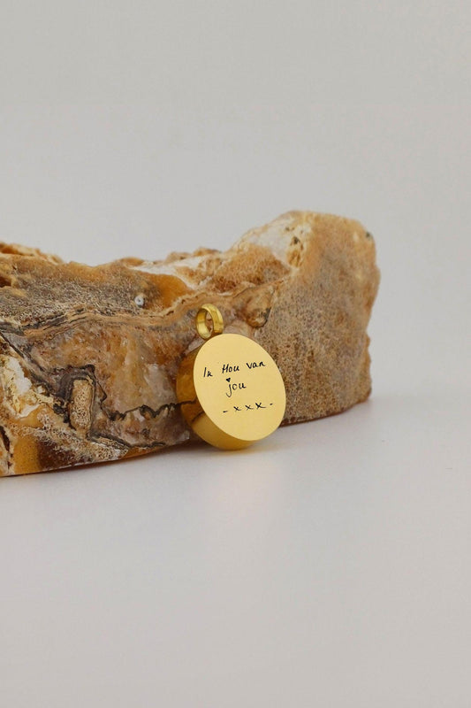 ashanger met handgeschreven tekst goudkleurig