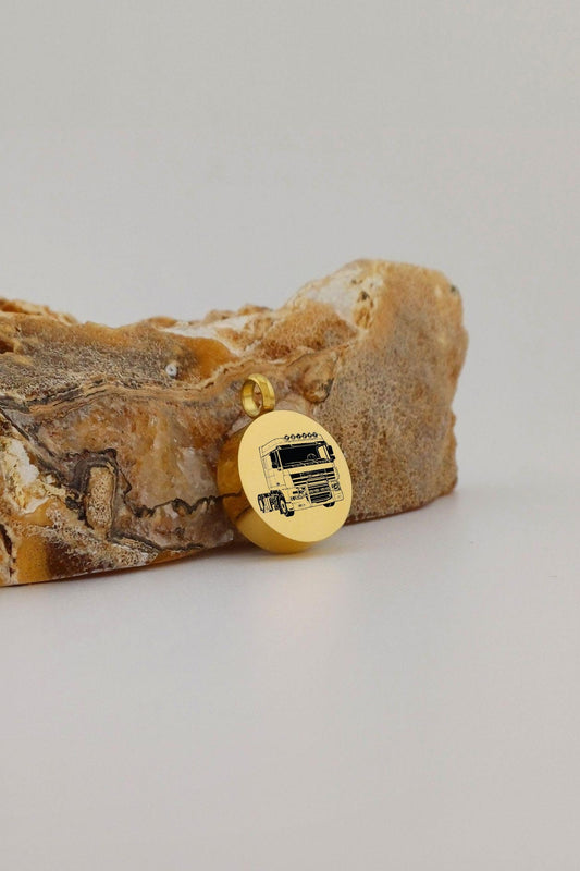 vrachtwagen ashanger rond goudkleurig