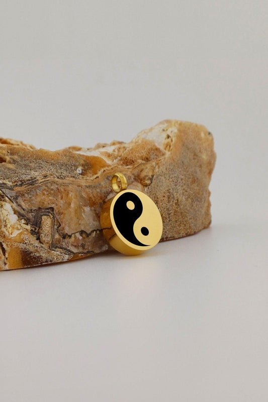 yin yang ashanger rond goudkleurig